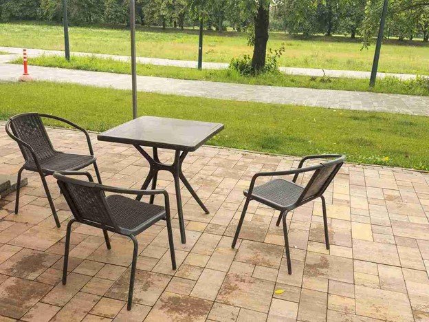 Completed concrete patio with outdoor seating area and clean paver layout in North Ridgeville, OH