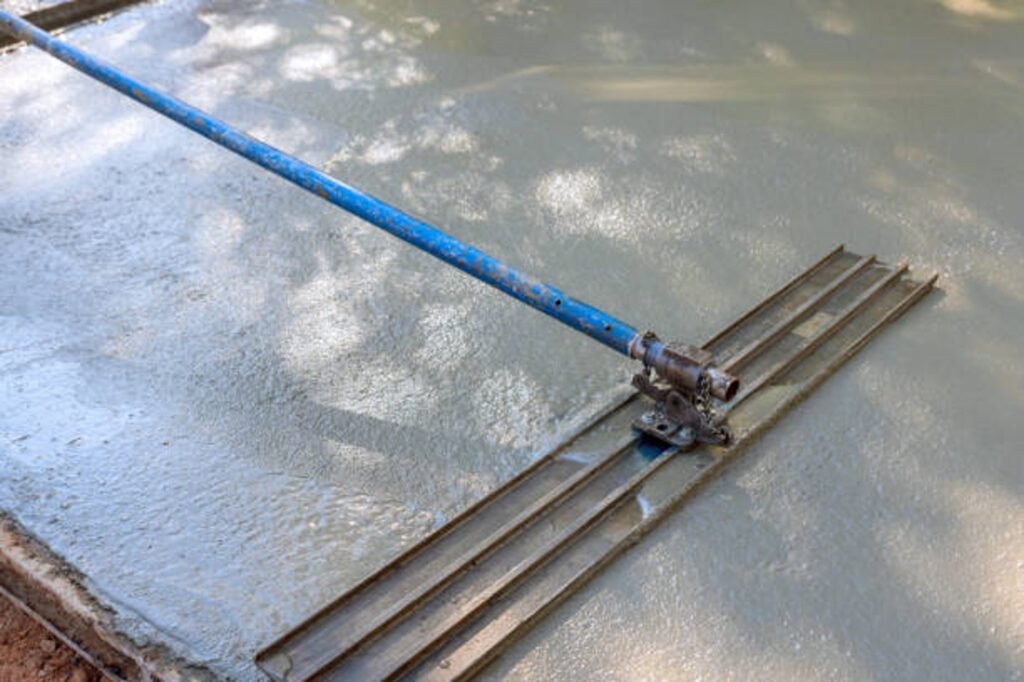 Foundation preparation area with grading and reinforcement setup before concrete installation in North Ridgeville, OH